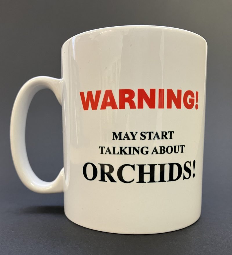 Elite Orchids 'May start talking about Orchids' Mug